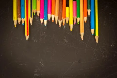 Dramatic group of pencils on black or dark background. Stock Photos