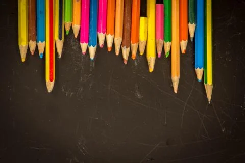 Dramatic group of pencils on black or dark background. Foto stock