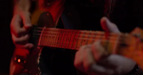 Dramatic Guitar Playing Closeup Stock Footage 201128836