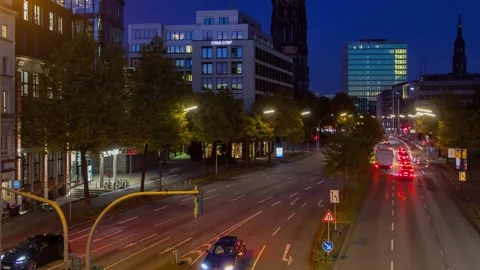 Dramatic Hamburg Skyline Evening View with Stunning Light Trails Stock Footage 309572792