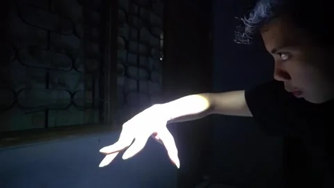 Dramatic Hand Gesture in Dim Light Stock Footage 313468179