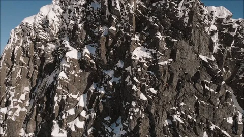 Dramatic hello from steep mountain in winter aerial view Stock Footage 99838754