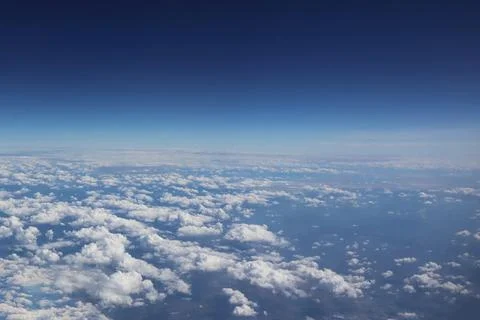Dramatic horizon freshness deep blue sky aerial view from aircraft with sof.. Stock Photos