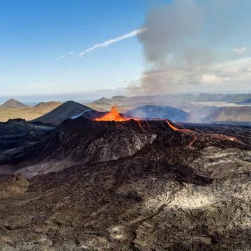 Dramatic Icelandic Volcanic Eruption Bright Orange Lava Streams Stock Photos