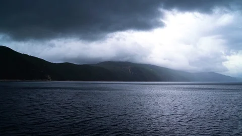 Dramatic image of agitated sea near mountain island, Croatia. Stock Footage 107576501