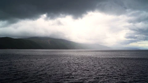 Dramatic image of agitated sea near mountain island, Croatia. Vídeo Stock 107576769