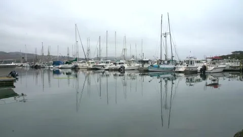 Dramatic image of boats reflecting in the bodega bay waters Stock Footage 159696376