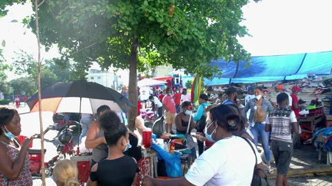 Dramatic image of downtown Haitian market in santo domingo Stock Footage 145691498