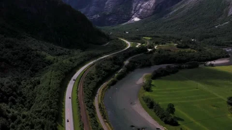 Dramatic Jagged Mountains of Troll Wall in Norway Surrounded by Cloud Stock Footage 252612428