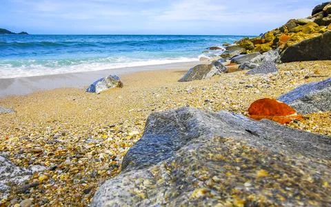 Dramatic Kalim Beach With Massive Rocks And Turquoise Waves Under Blue Sky .. Stock Photos