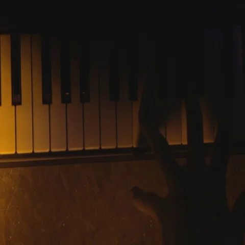 Dramatic Keyboard Playing with Changing Colored Lights Stock Footage 69691488