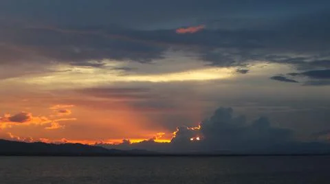 Dramatic Lake at Sunset with Cloudy Sky 스톡 사진