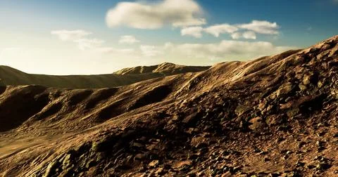 Dramatic landscape featuring rocky terrain and gentle hills at sunset Stock Illustration