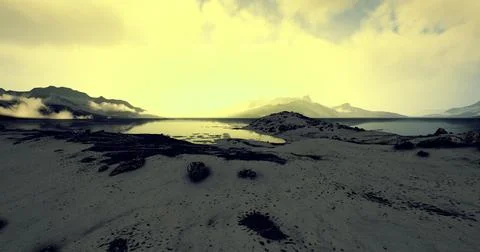 Dramatic landscape featuring serene water and distant mountains at dawn Stock Illustration