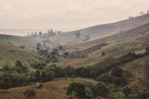 Dramatic landscape of fields and farms in highlands of Ring Road region Stock Photos