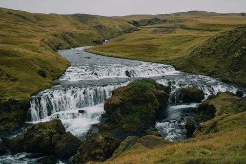 The dramatic landscape of Iceland, with a powerful waterfall Stock Photos