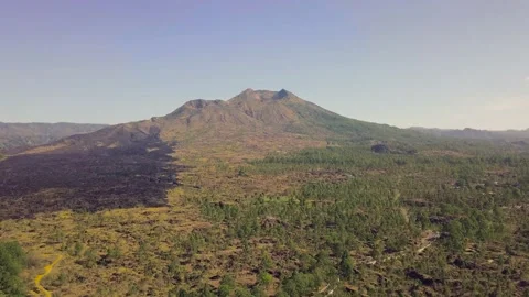 Dramatic landscape of a mountain volcano on summer day with partly burnt bushes. Stock Footage 131373632