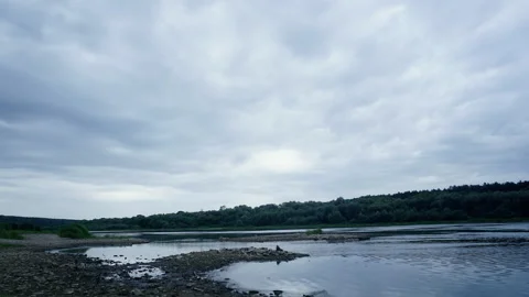 Dramatic landscape with overcast clouds and river. Stock Footage 206097250
