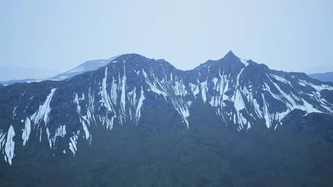 Dramatic landscape of peaks of the high Caucasus mountains and white snow Stock Footage 229640872