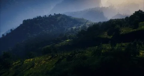 Dramatic landscape with rolling hills under moody sky at sunrise Illustrazione stock
