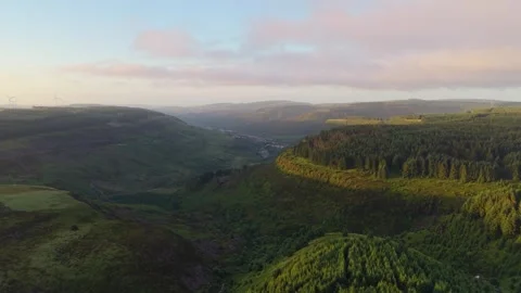 Dramatic Landscape of South Wales Valleys at Sunrise with Forest Covered Stock Footage 340193557