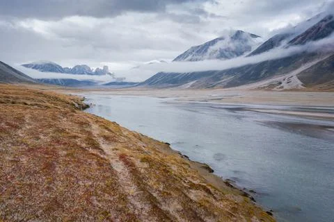 Dramatic landscape of wild, remote valley in the far north on a cloudy, rainy Stock Photos