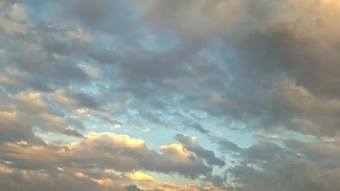 Dramatic Layered Clouds at Golden Hour Sky Stock Footage 332500945