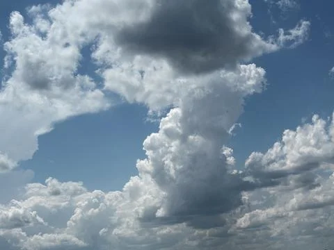 Dramatic Layered Cumulus Clouds in Summer Sky Stock Photos