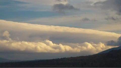 Dramatic Lenticular Clouds Over Southern Urals Mountain Range at Sunset Stock Footage 325468040
