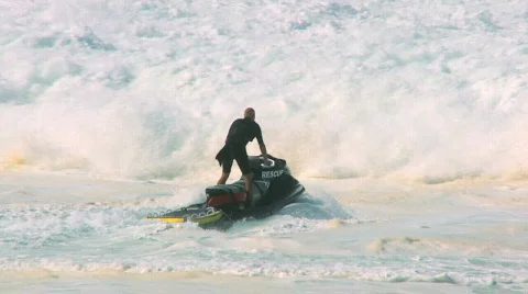 Dramatic Lifeguard Jetski Launch 60FPS Stock Footage 630560