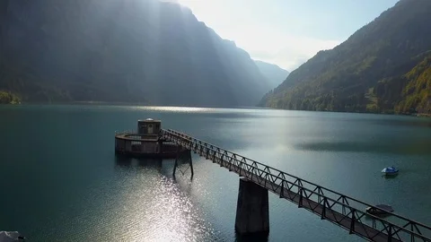 Dramatic Light and Shadow Contrast over Lake Road Landscape Panorama Stock Footage 97457093