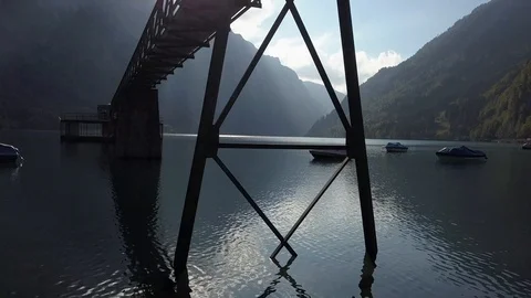 Dramatic Light and Shadow Contrast over Lake Road Landscape Panorama Stock Footage 97458467