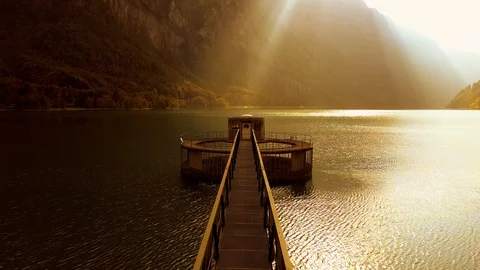 Dramatic Light and Shadow Contrast over Lake Road Landscape Panorama Stock Footage 97458896