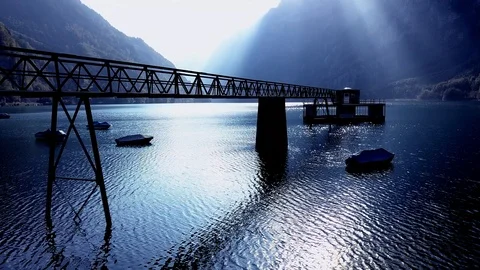 Dramatic Light and Shadow Contrast over Lake Road Landscape Panorama Stock Footage 97461273