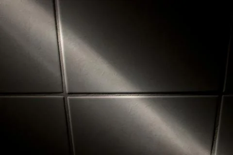 Dramatic light on bathroom tiles Stock Photos