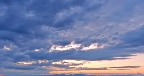 Dramatic light colorful sky orange during purple sunset natural landscape Stock Footage 220018992