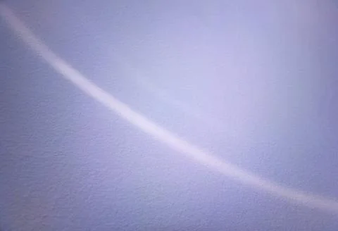 Dramatic light curve on concrete wall background Foto stock