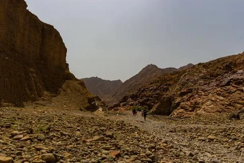 Dramatic Light Illuminates Ancient UAE Mountain Canyon Stock Photos