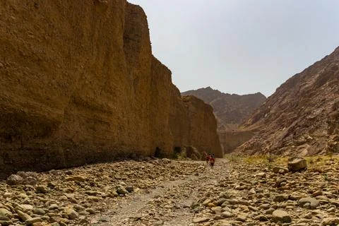 Dramatic Light Illuminates Ancient UAE Mountain Canyon Stock Photos
