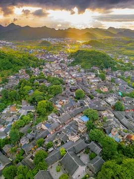 Dramatic light over Qingyan Ancient Town, one of the top 4th famous old towns Stock Photos