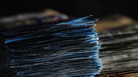 Dramatic Light on Rotating Euro Banknote Stack – 20 Euro Notes on Top Close Up Stock Footage 313924921