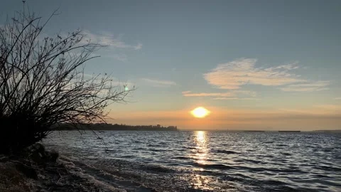 Dramatic light in the sea against the backdrop of city. Beautiful background 스톡 동영상 143379814