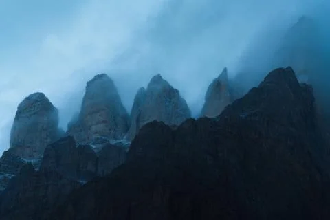 Dramatic light with silhouette of mountains Stock Photos