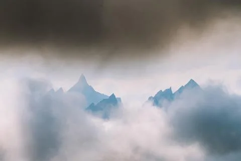 Dramatic light with silhouette of mountains Stock Photos