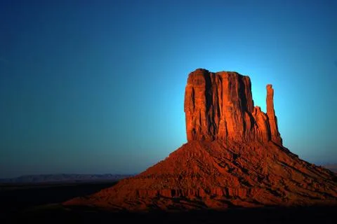 Dramatic light striking a rock formation in monument valley Foto stock