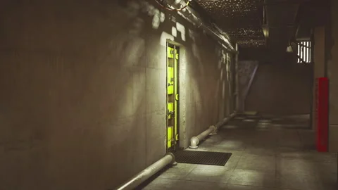 Dramatic lighting highlights emergency exit with protective barriers Stock Footage 341825423