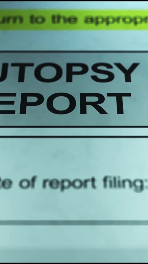 Dramatic Lighting over Generic Autopsy Report - Vertical Stock Footage 328522509