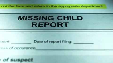 Dramatic Lighting over Generic Missing Child Report Form Stock Footage 328508556