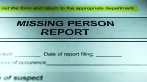 Dramatic Lighting over Generic Missing Person Report Form Stock Footage 328508564
