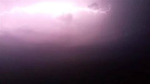 Dramatic Lightning Bolt Striking Through Dark Night Storm Clouds Vídeos de archivo 339317186